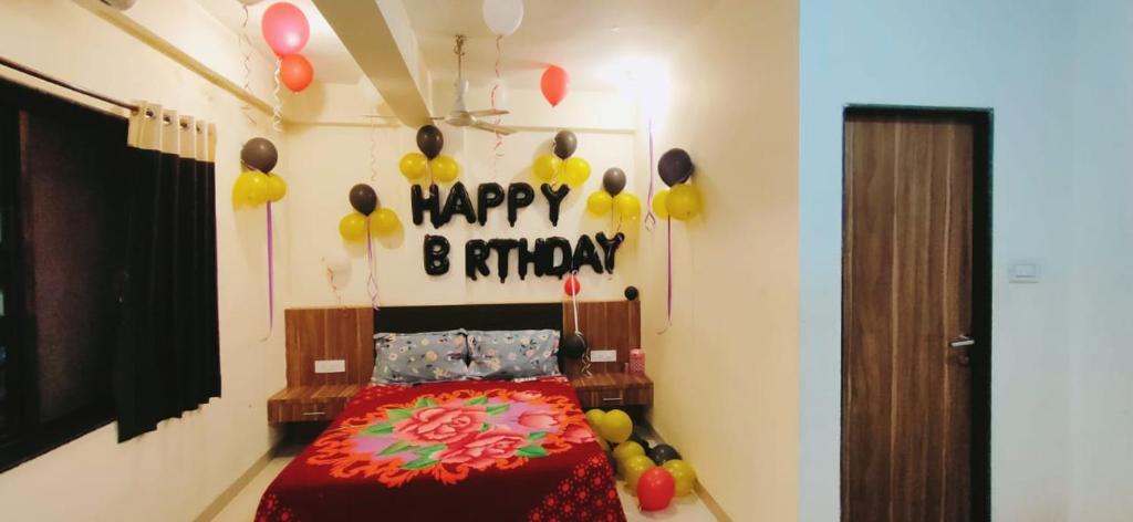 Posteľ alebo postele v izbe v ubytovaní Happy Stay, Panchgani