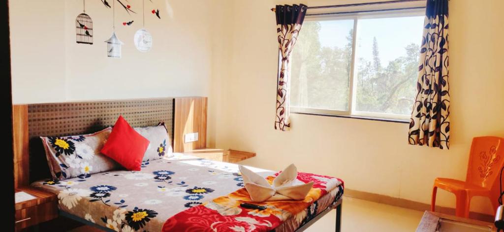 Posteľ alebo postele v izbe v ubytovaní Happy Stay, Panchgani