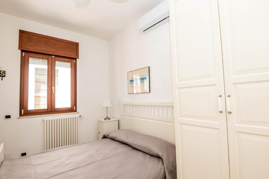 Postel nebo postele na pokoji v ubytování Sosandra Rooms
