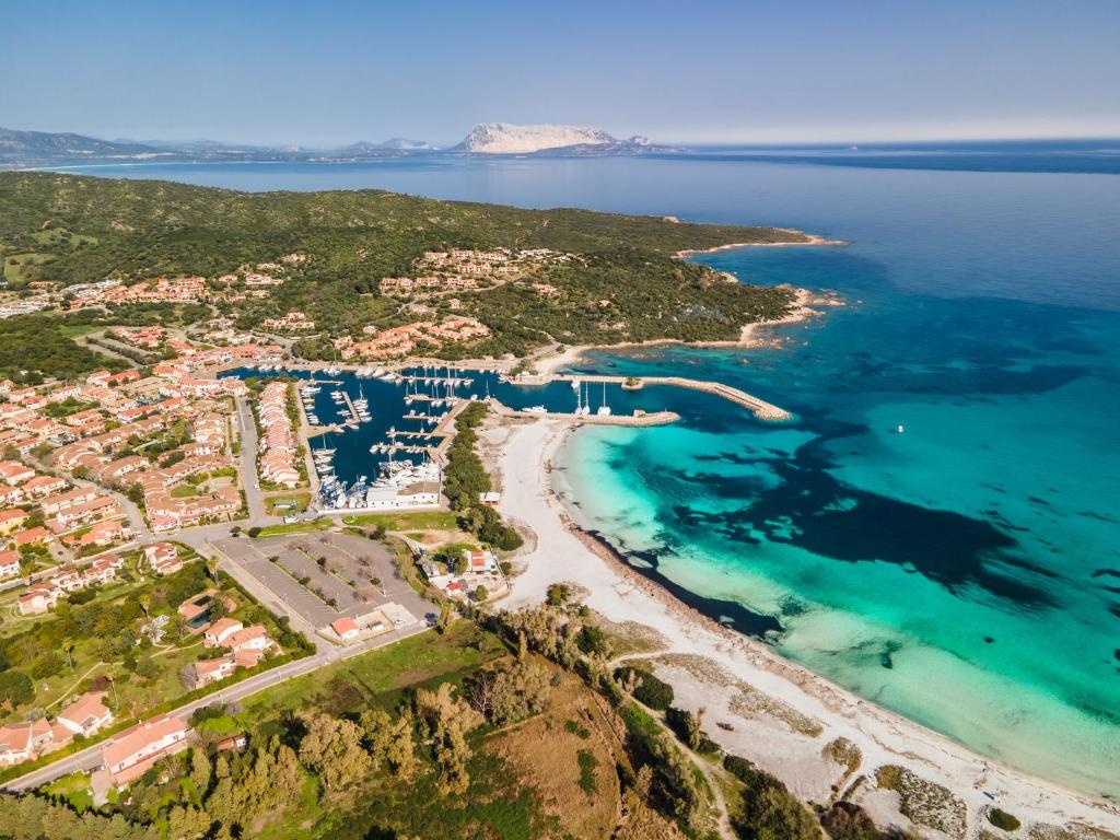 an aerial view of a beach and the ocean at CASA PAU in Porto Ottiolu