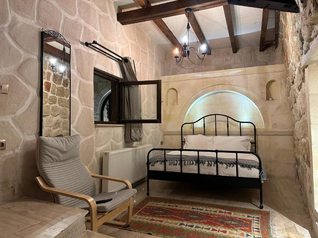 Postel nebo postele na pokoji v ubytování Corner İn Cappadocia
