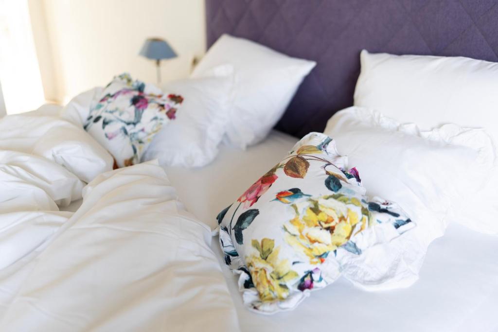 Postel nebo postele na pokoji v ubytování Nomad Rooms