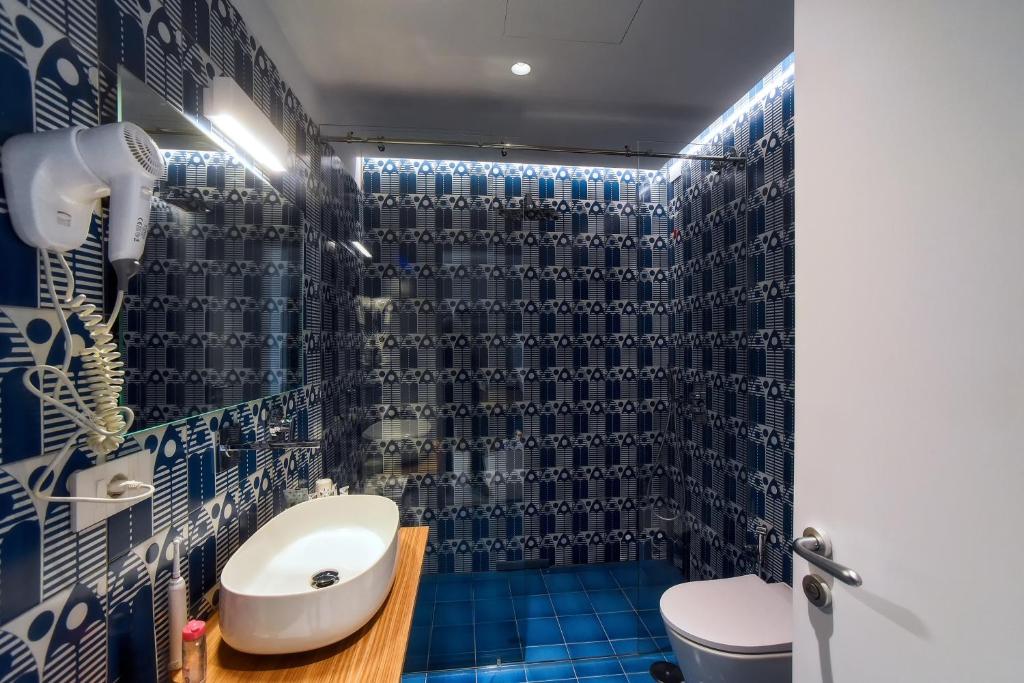 Koupelna v ubytování Hotel Graal