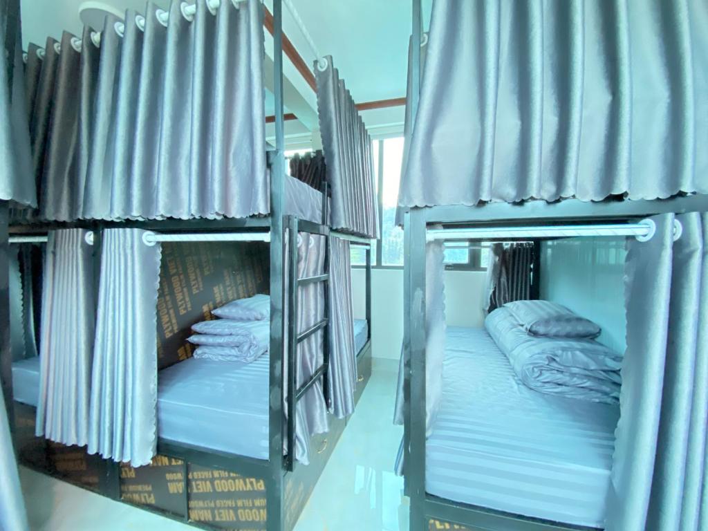 Postel nebo postele na pokoji v ubytování Van Anh Hotel - Restaurant
