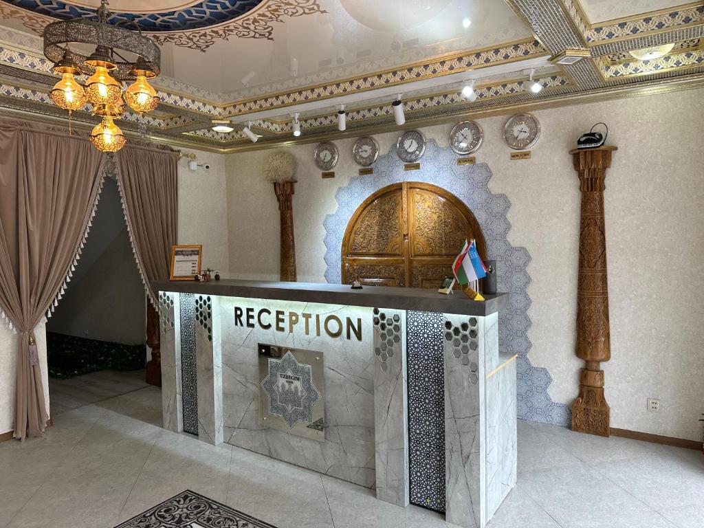 a room with a reception desk in a building at HOTEL UZBEGIM in Urganch