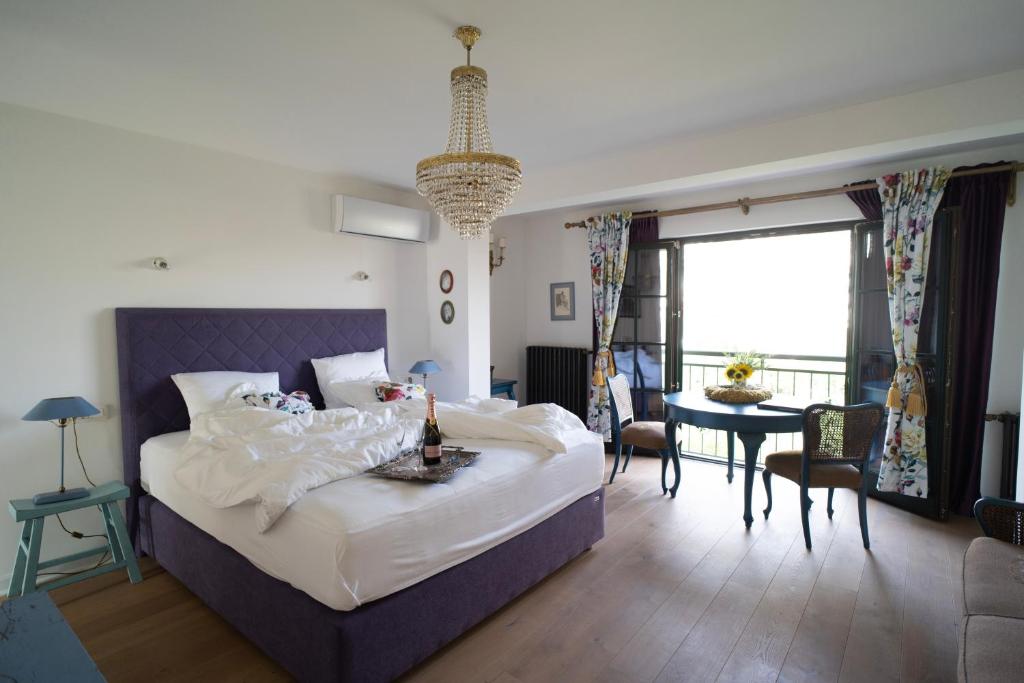 Postel nebo postele na pokoji v ubytování Nomad Rooms