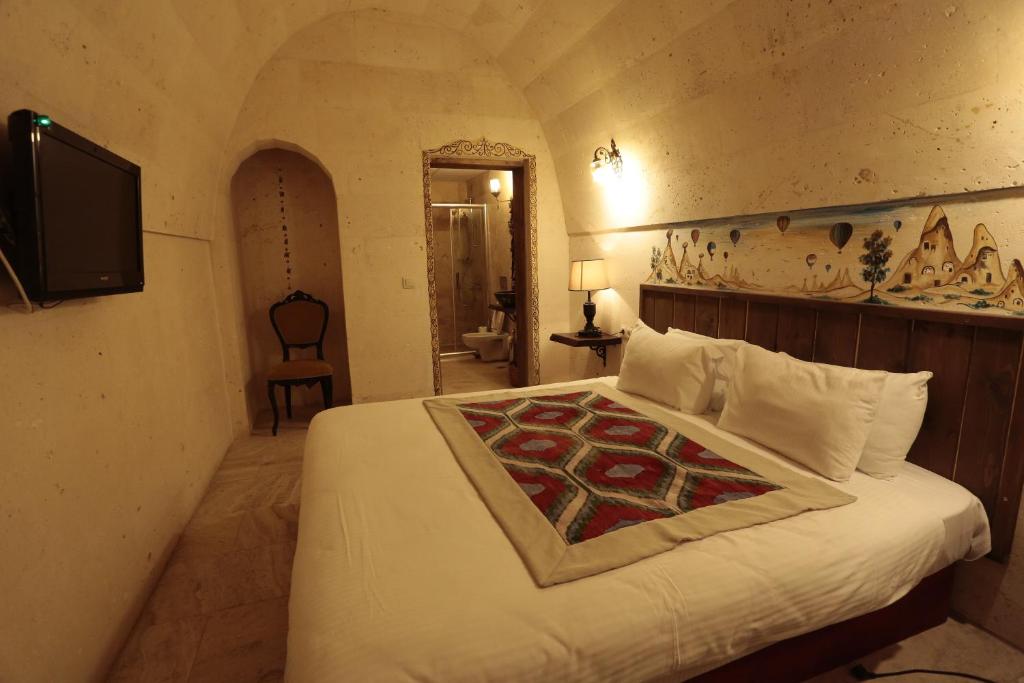 Postel nebo postele na pokoji v ubytování Corner İn Cappadocia