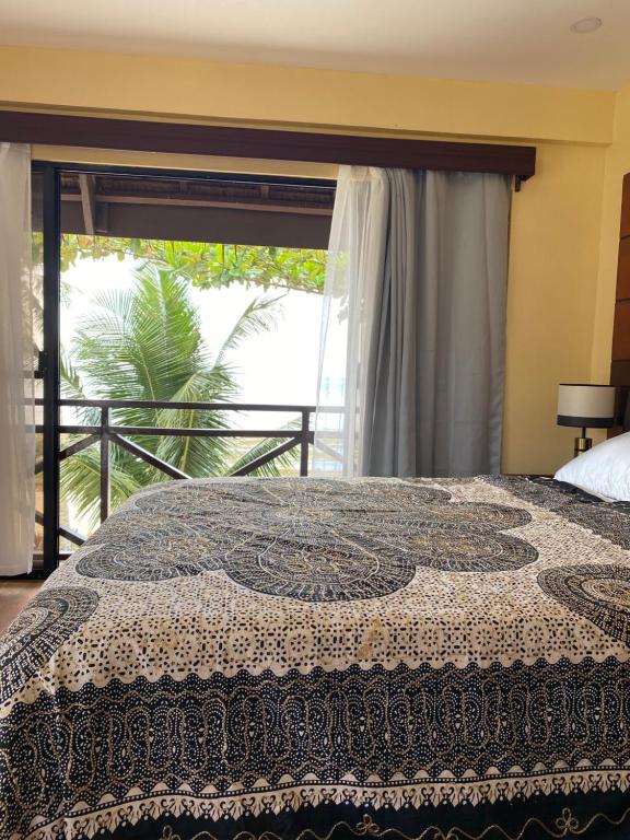 Postel nebo postele na pokoji v ubytování Entire Private Beachfront Villa in Siargao