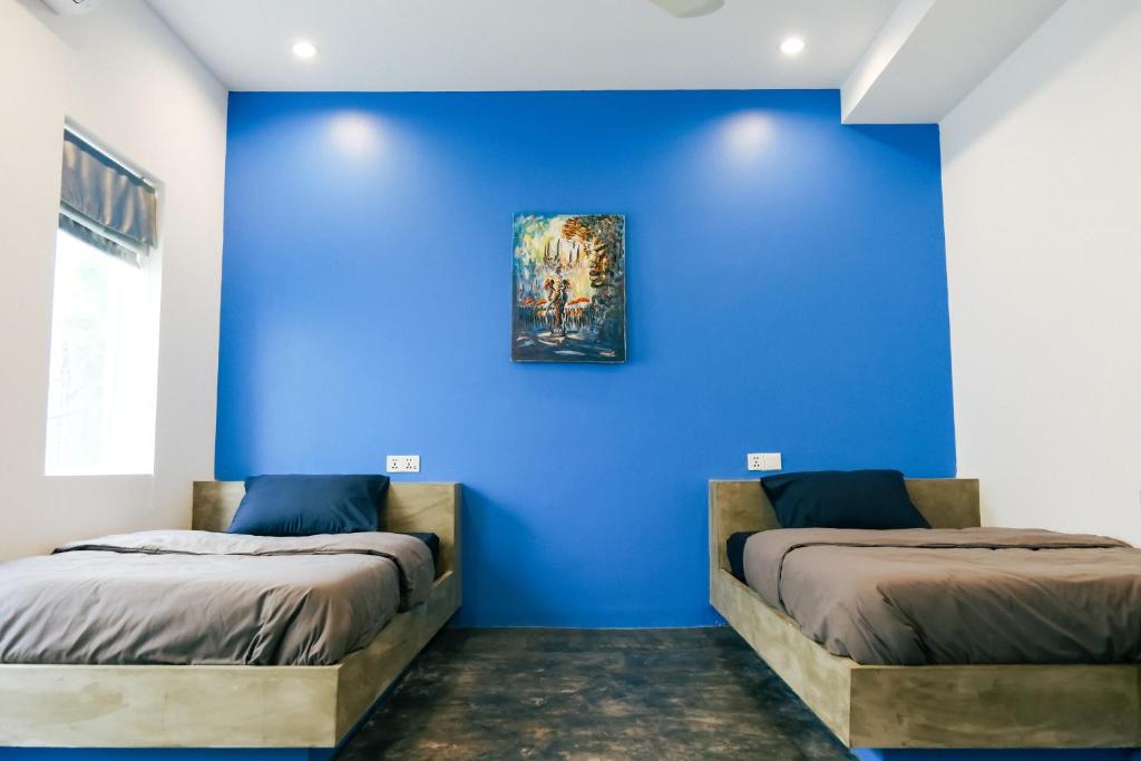 Postel nebo postele na pokoji v ubytování Queentown Hostel
