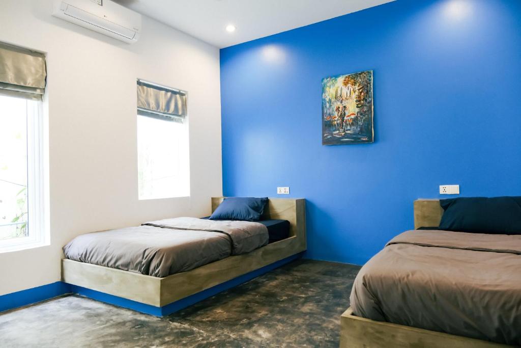 Postel nebo postele na pokoji v ubytování Queentown Hostel