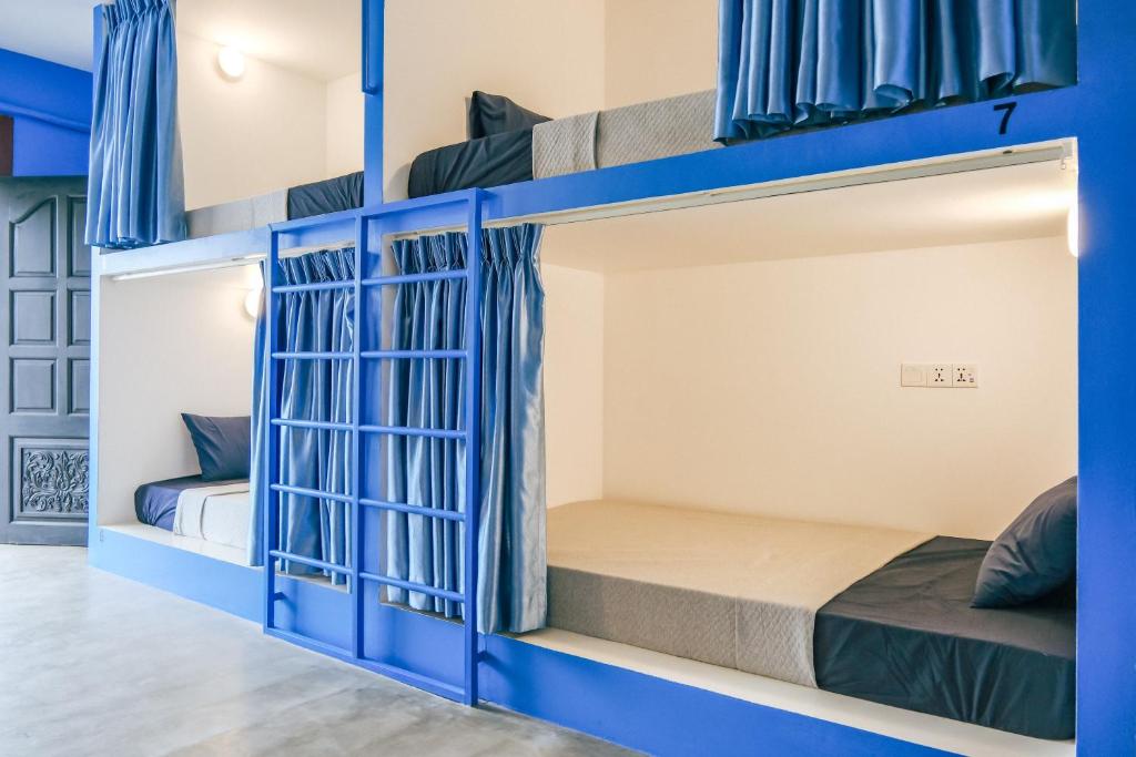Postel nebo postele na pokoji v ubytování Queentown Hostel