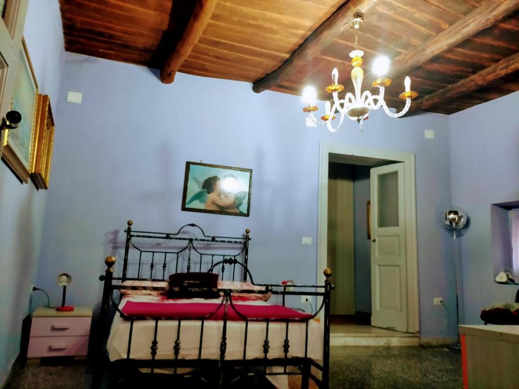 Posteľ alebo postele v izbe v ubytovaní Casa vacanza zia Ersilia