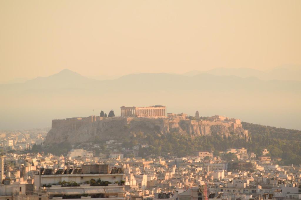 a view of a city with a mountain at Acropolis Panorama Studio in Athens