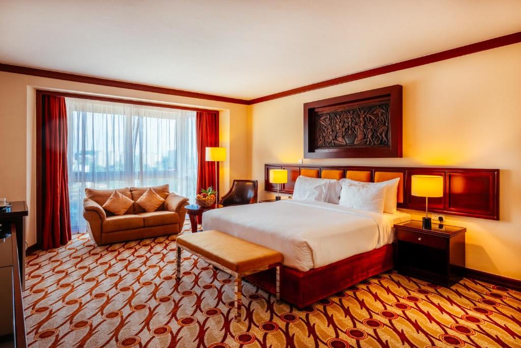 Postel nebo postele na pokoji v ubytování Mövenpick Hotel & Residences Nairobi