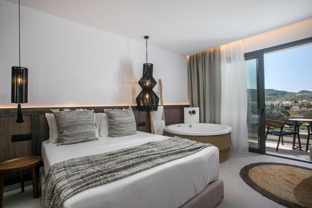 Postel nebo postele na pokoji v ubytování Vanik Suites