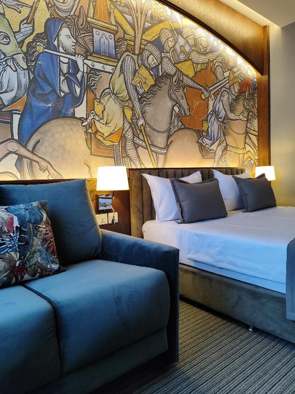 Postel nebo postele na pokoji v ubytování Orienta Hotel Gyumri