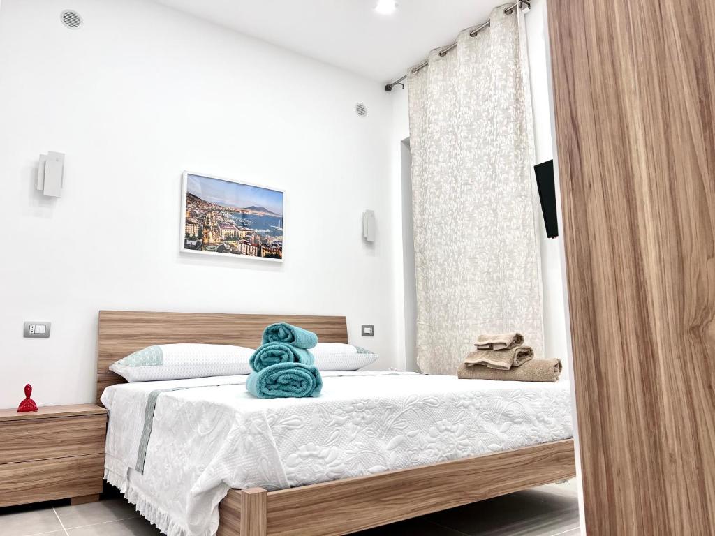 Ліжко або ліжка в номері Casa Vacanza da Zia Susetta
