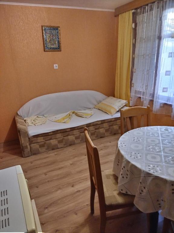 Postel nebo postele na pokoji v ubytování Apart Hotel Hetodon