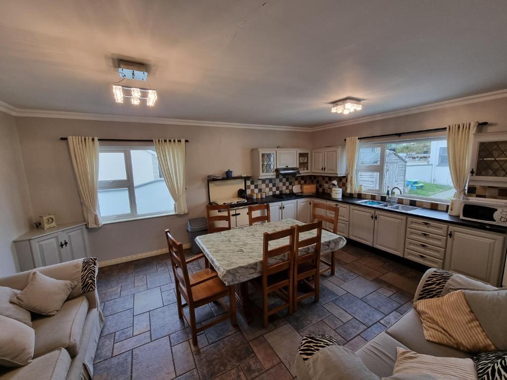 Kuchyň nebo kuchyňský kout v ubytování Elemey House
