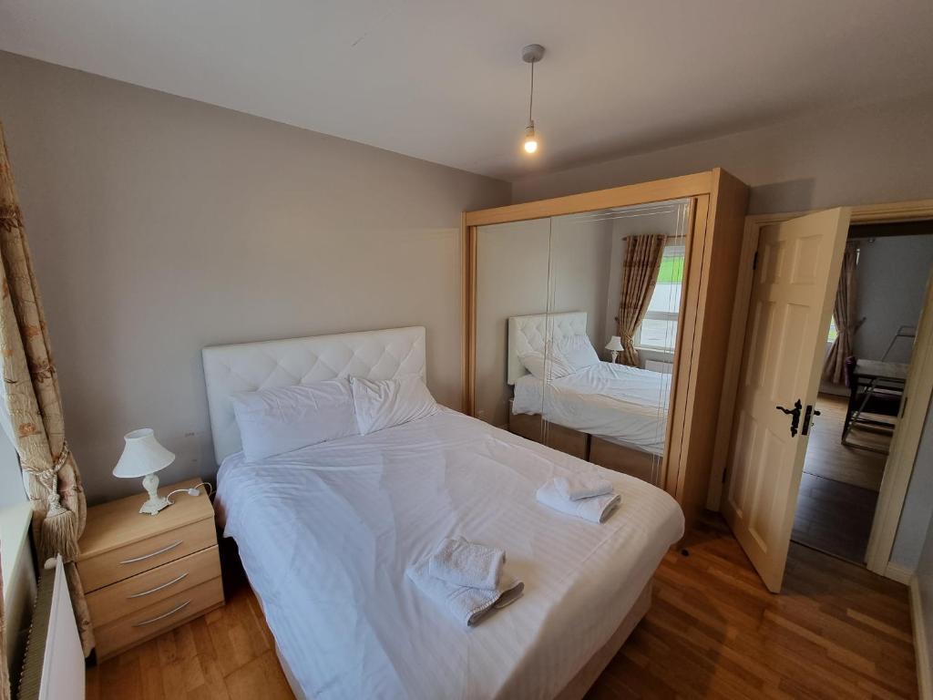 Postel nebo postele na pokoji v ubytování Elemey House