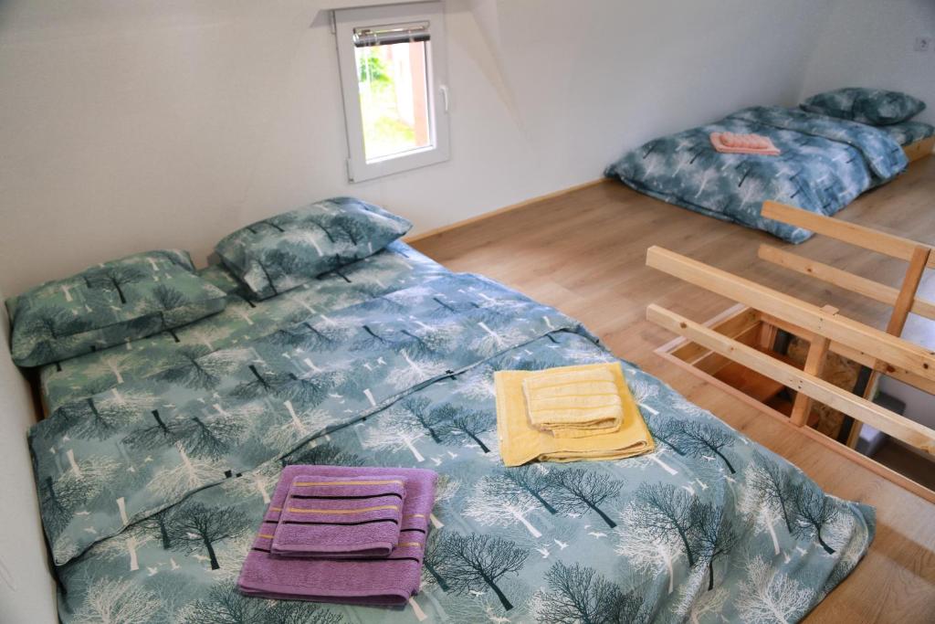 Postel nebo postele na pokoji v ubytování Bungalows Fairy tale