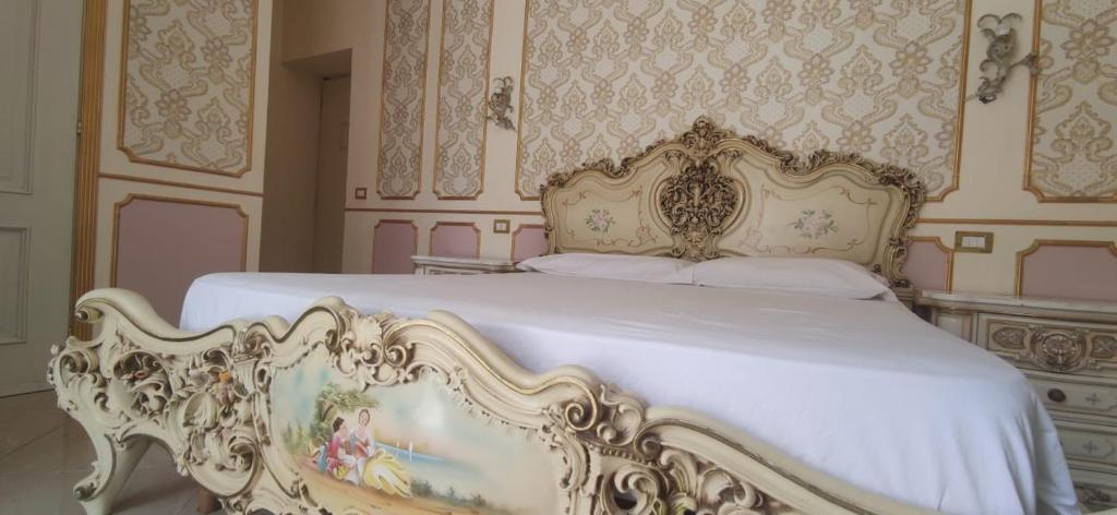 Postel nebo postele na pokoji v ubytování B&B IL TEMPIO