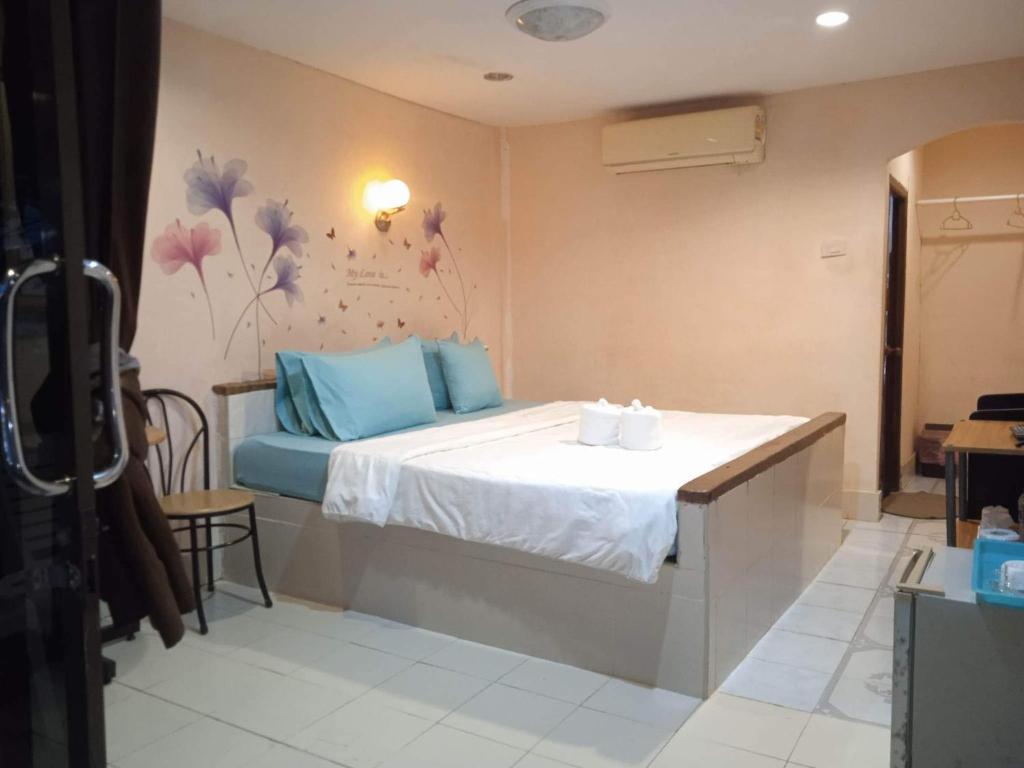 Postel nebo postele na pokoji v ubytování Marina Resort