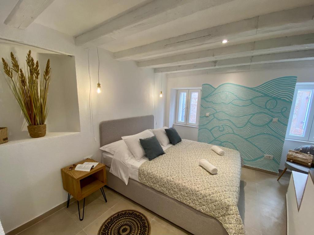 Postel nebo postele na pokoji v ubytování House Malena - Rooms