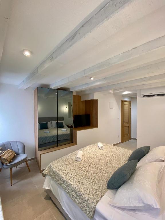 Postel nebo postele na pokoji v ubytování House Malena - Rooms