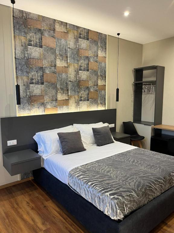 Postel nebo postele na pokoji v ubytování B&B MariLù