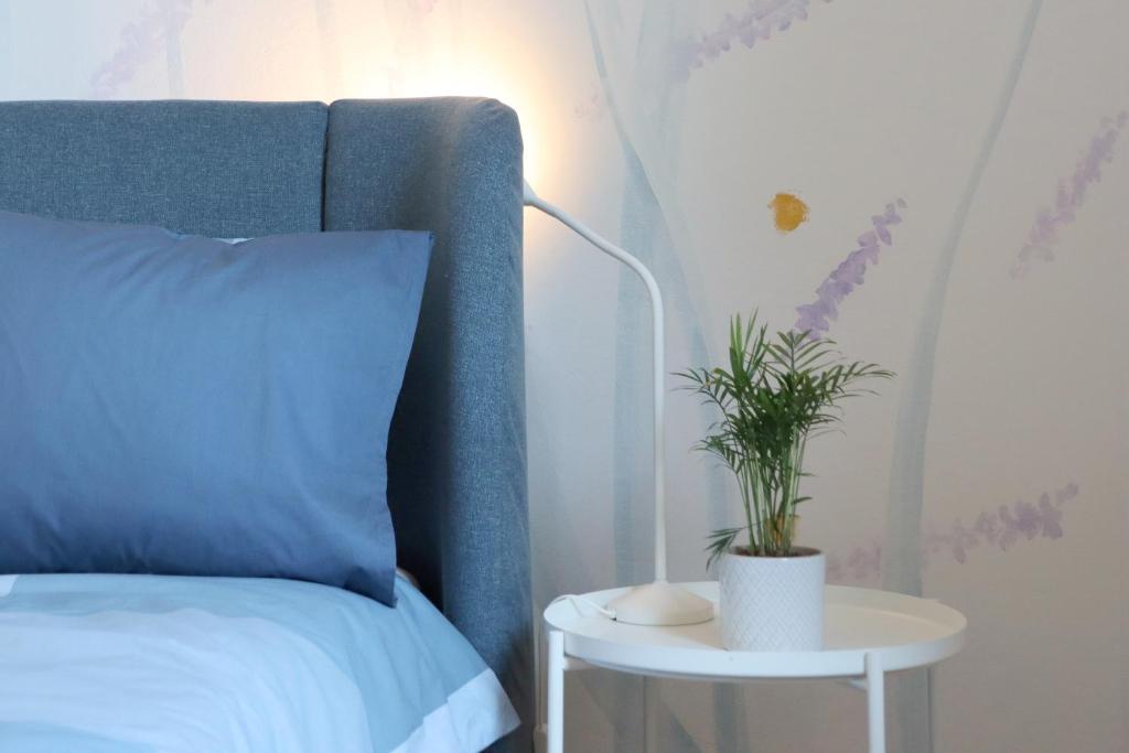 Postel nebo postele na pokoji v ubytování Garden Villa