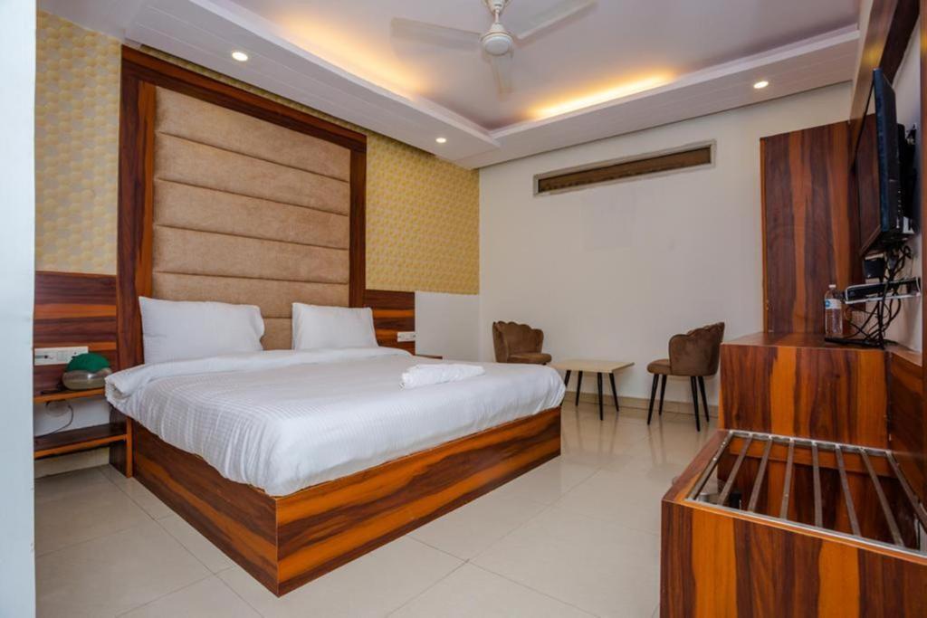 מיטה או מיטות בחדר ב-Hotel DOON