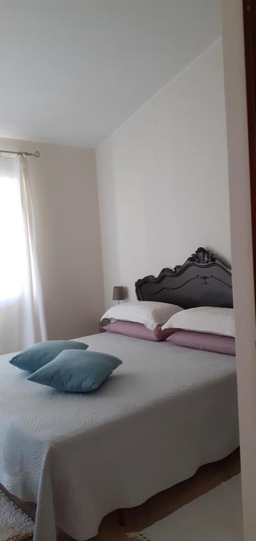 Postel nebo postele na pokoji v ubytování B&B Easy Wind