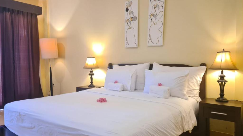 Postel nebo postele na pokoji v ubytování Dalia Budget Hotel