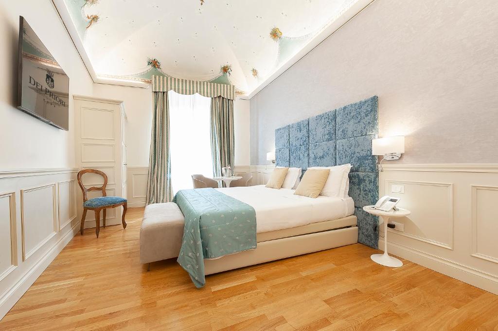 Posteľ alebo postele v izbe v ubytovaní Dei Priori Boutique Hotel