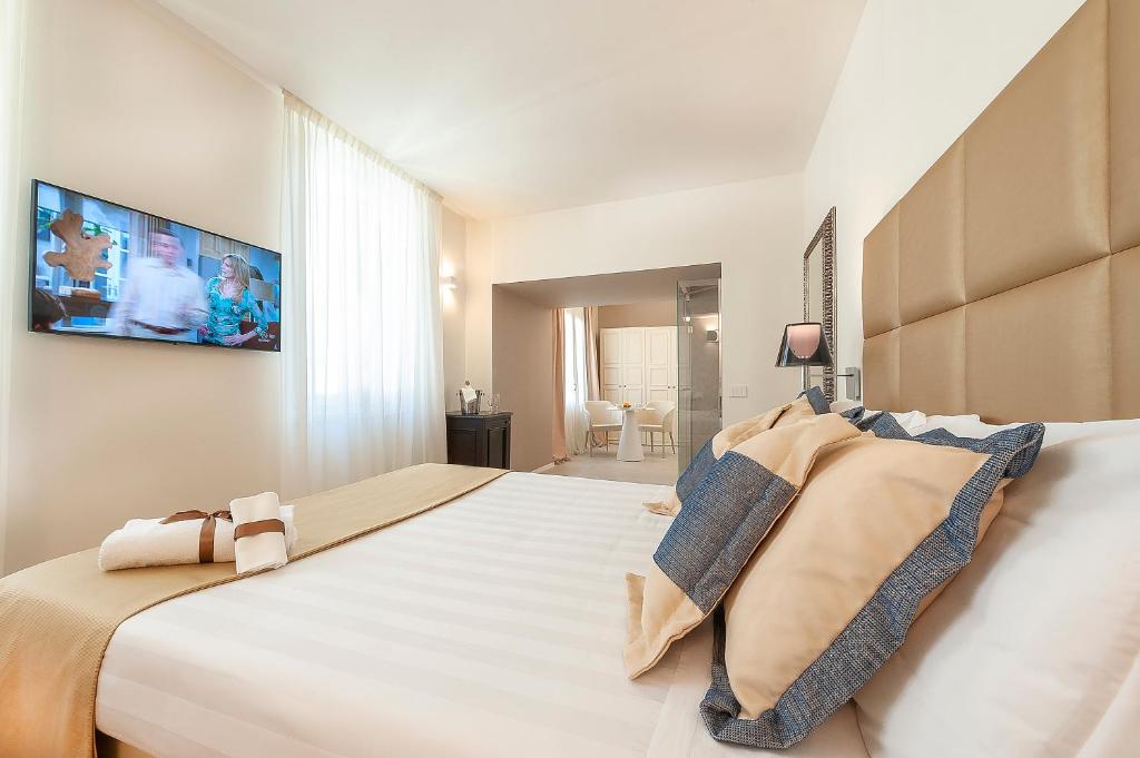 Posteľ alebo postele v izbe v ubytovaní Dei Priori Boutique Hotel