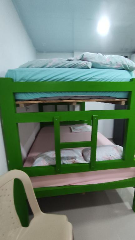 Postel nebo postele na pokoji v ubytování La Roca Coveñas Apartamentos