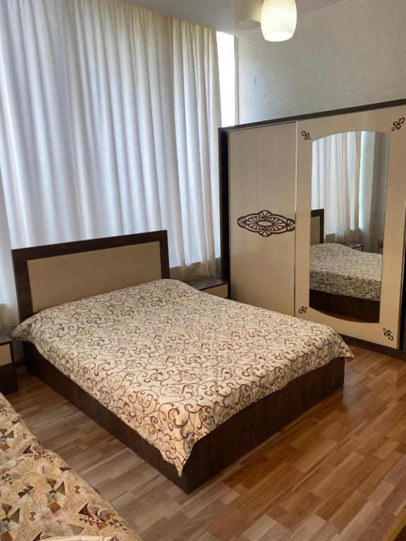 Postel nebo postele na pokoji v ubytování SARPI HOTEL NUMA