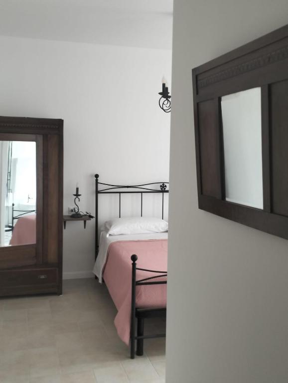 Postel nebo postele na pokoji v ubytování AGRITURISMO TERRAPIA
