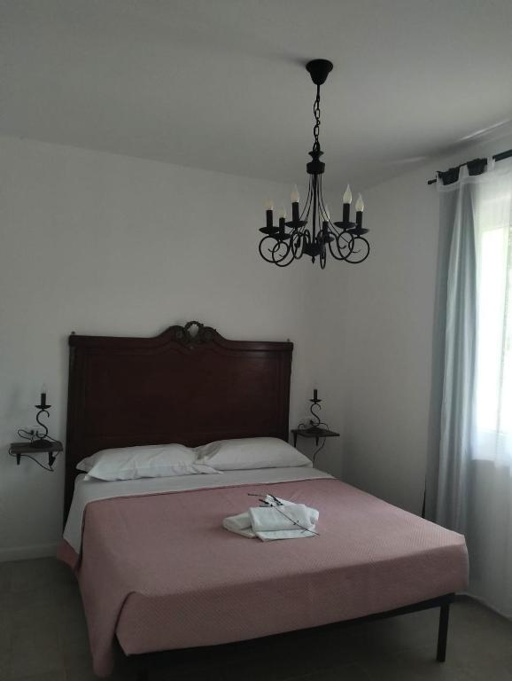 Postel nebo postele na pokoji v ubytování AGRITURISMO TERRAPIA