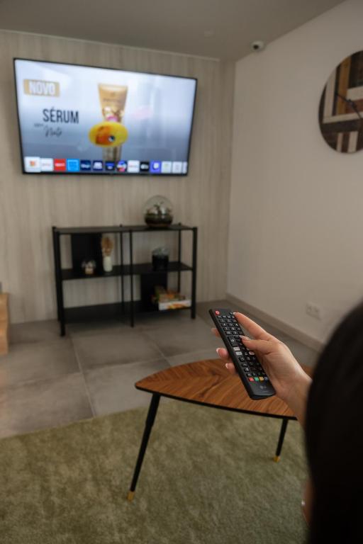 TV a/nebo společenská místnost v ubytování Ria Formosa Guest House
