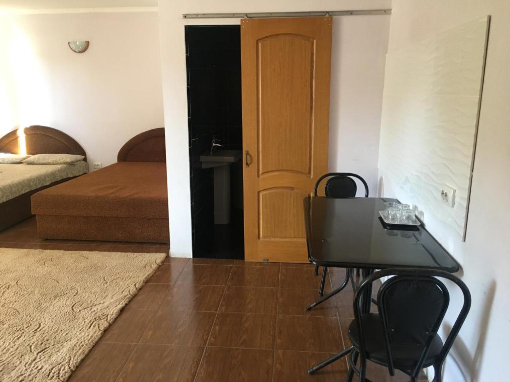 Postel nebo postele na pokoji v ubytování Номер та Паркінг- Світло Є