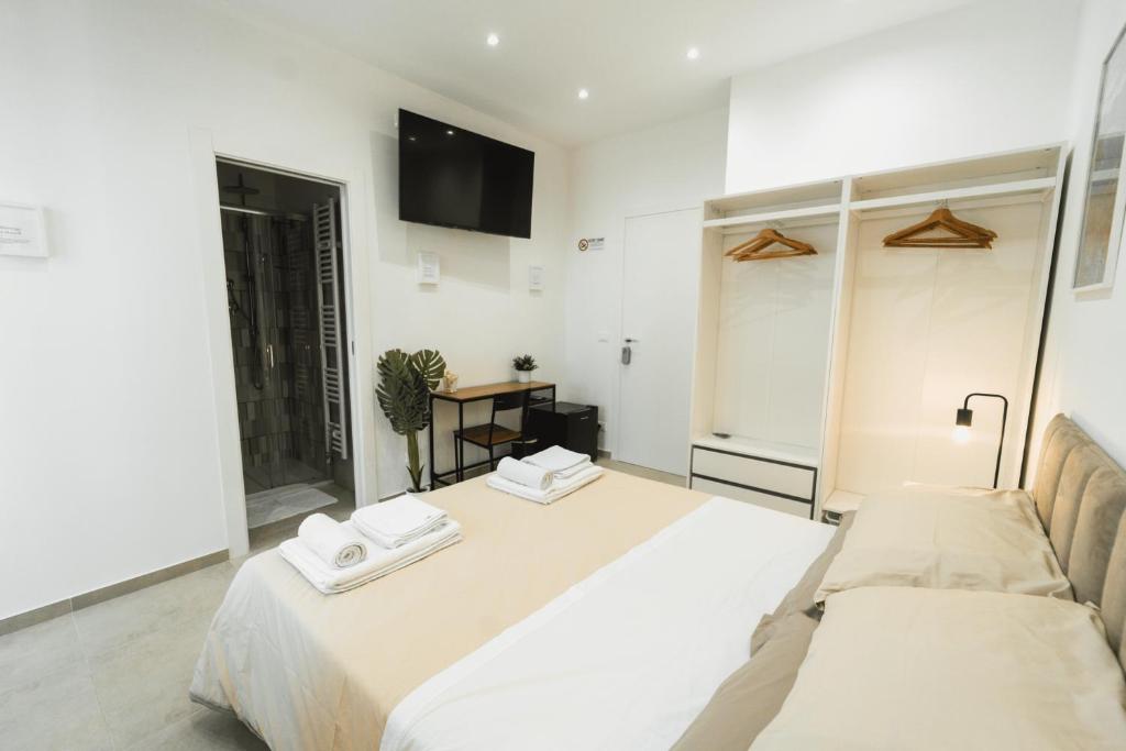 Postel nebo postele na pokoji v ubytování Mare Fuori B&B