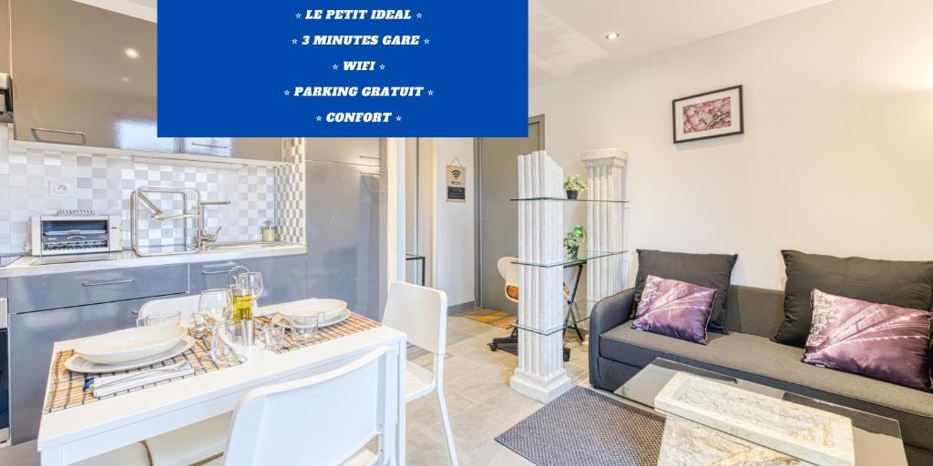 un salon avec un canapé et une table dans l'établissement Le Petit Idéal Confort Gare Netflix Stationnement proche et gratuit, à Grenoble