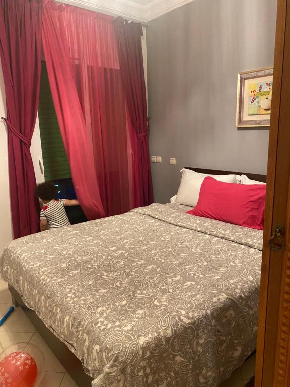 Postel nebo postele na pokoji v ubytování Appartement résidence Al Kawtar