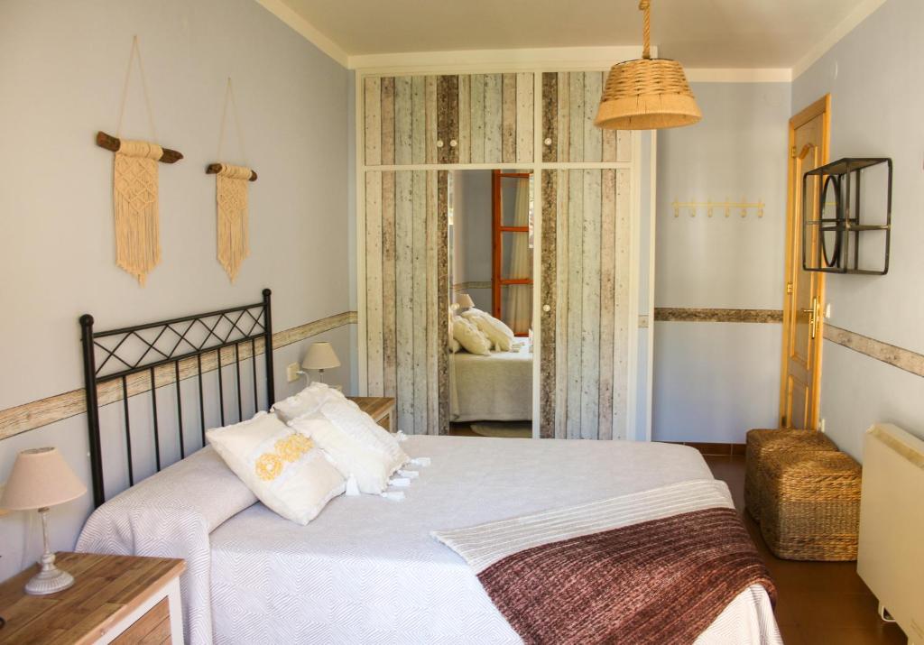 Posteľ alebo postele v izbe v ubytovaní Apartament Montsent
