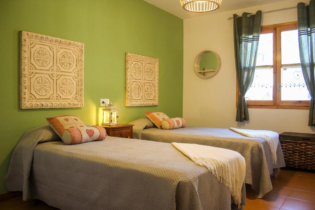 Posteľ alebo postele v izbe v ubytovaní Apartament Montsent