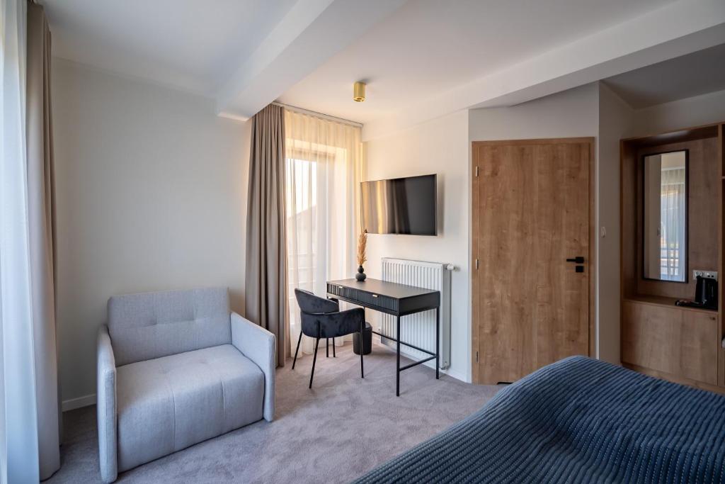 Posezení v ubytování APARTHOTEL KLEOSIN
