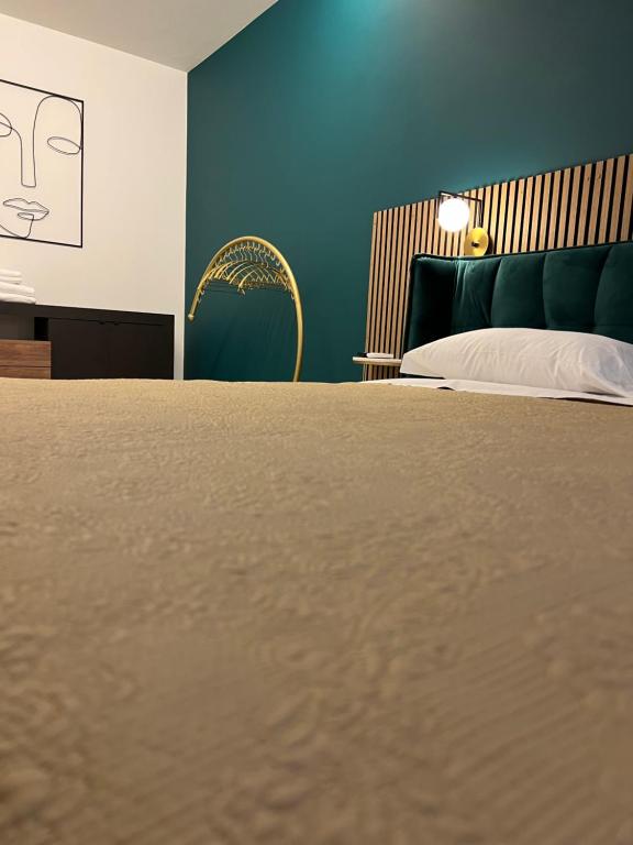 Een bed of bedden in een kamer bij Loft Sirmione