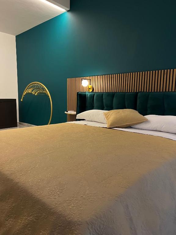 Een bed of bedden in een kamer bij Loft Sirmione